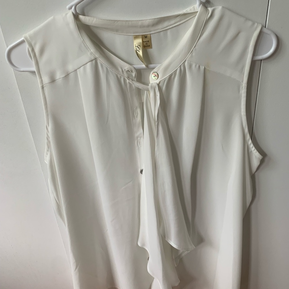 Sleeveless blouse white tank top